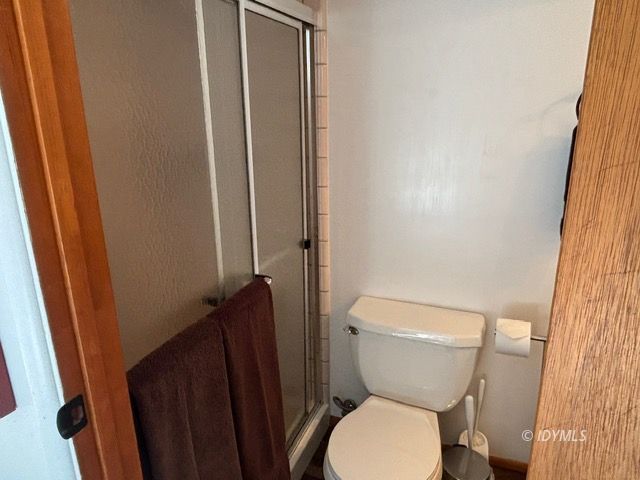 25405 Seneca Road Idyllwild, CA 92549 - Photo 27 of 27 a toilet sitting in a bathroom next to a sink