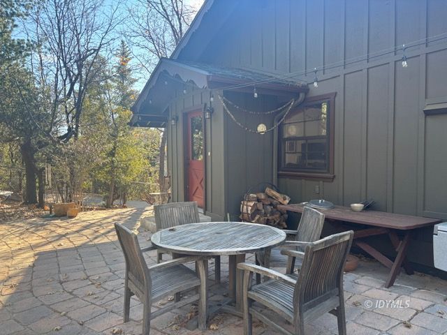 25405 Seneca Road Idyllwild, CA 92549 - Photo 4 of 27 a outdoor dining space with furniture and outdoor view