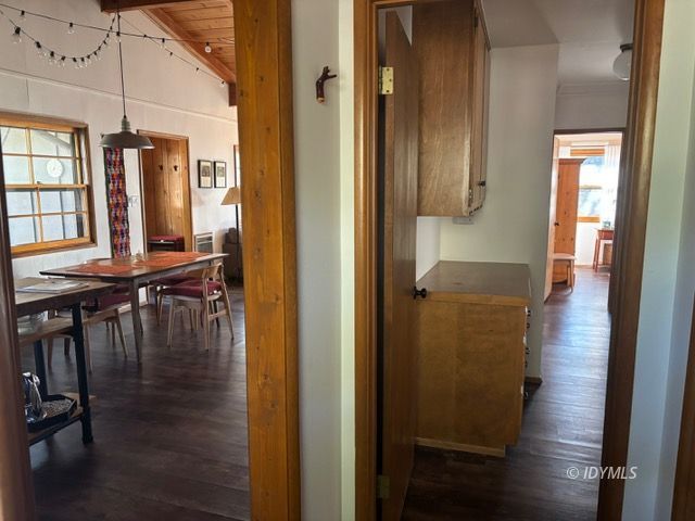 25405 Seneca Road Idyllwild, CA 92549 - Photo 7 of 27 a view of hallway with livingroom and wooden floor