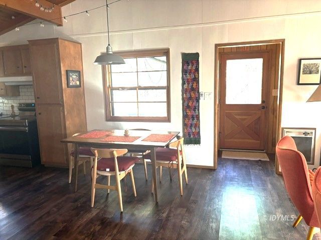 25405 Seneca Road Idyllwild, CA 92549 - Photo 10 of 27 a view of a dining room with furniture window and wooden floor