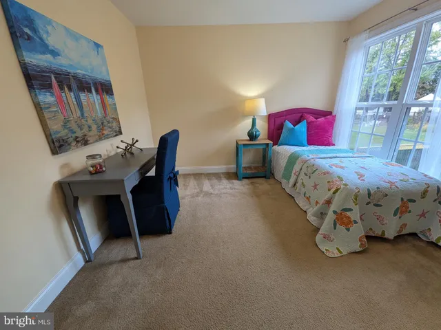 an aerial view of a house with a garden