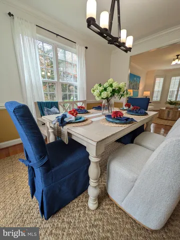 a vase with flowers sitting on a table