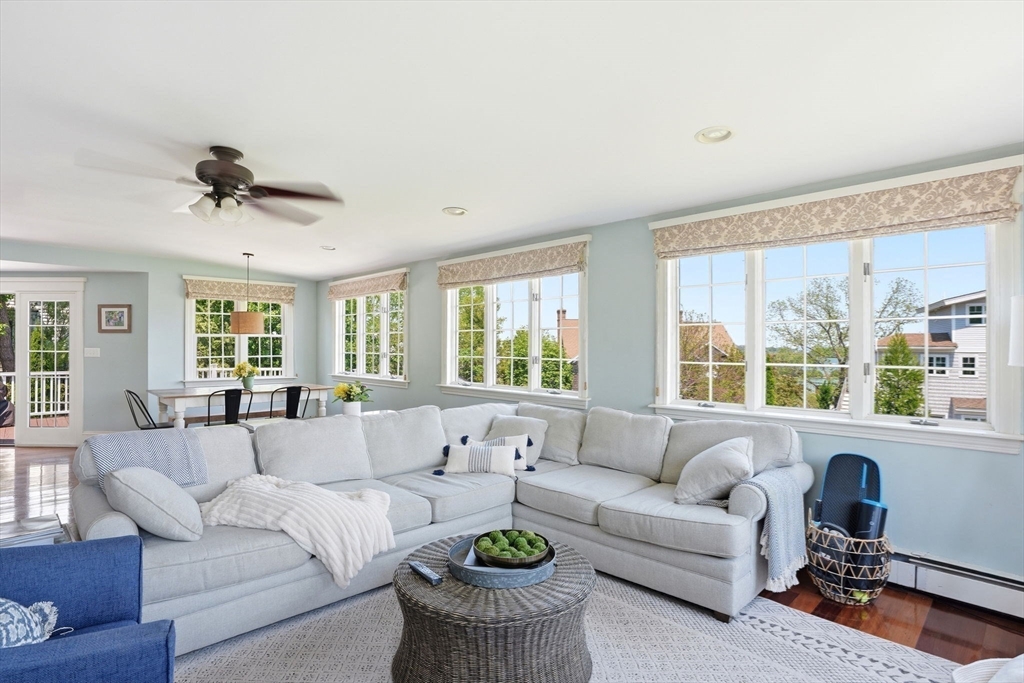 3 Talbot Road Hingham, MA 02043 - Photo 13 of 34 a living room with furniture a chandelier and a large window