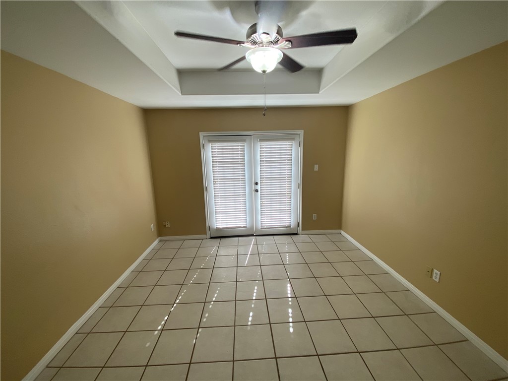 15410 Cruiser Street, Unit B Corpus Christi, TX 78418 - Photo 18 of 25 a view of an empty room with a window