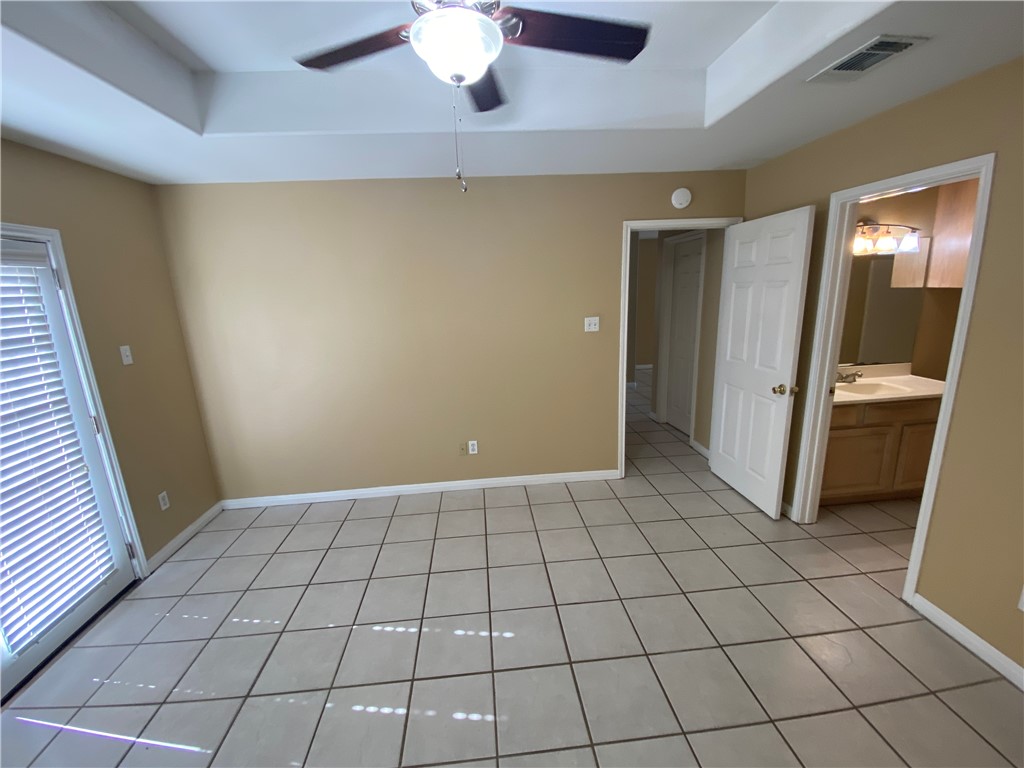 15410 Cruiser Street, Unit B Corpus Christi, TX 78418 - Photo 19 of 25 a view of an empty room with a fireplace