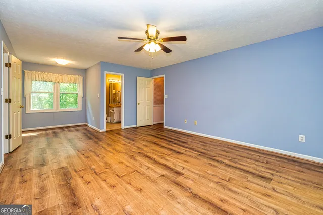 a bathroom with a toilet and a sink