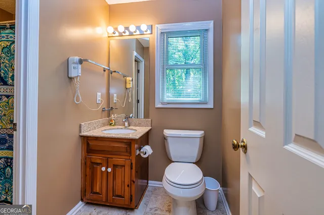 a backyard of a house with lots of green space