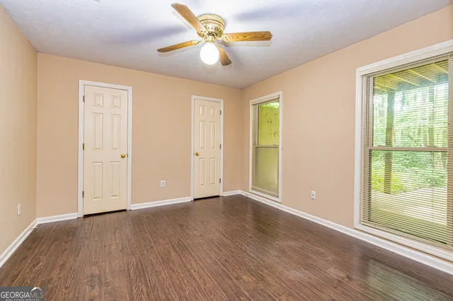 a view of a lake with a yard