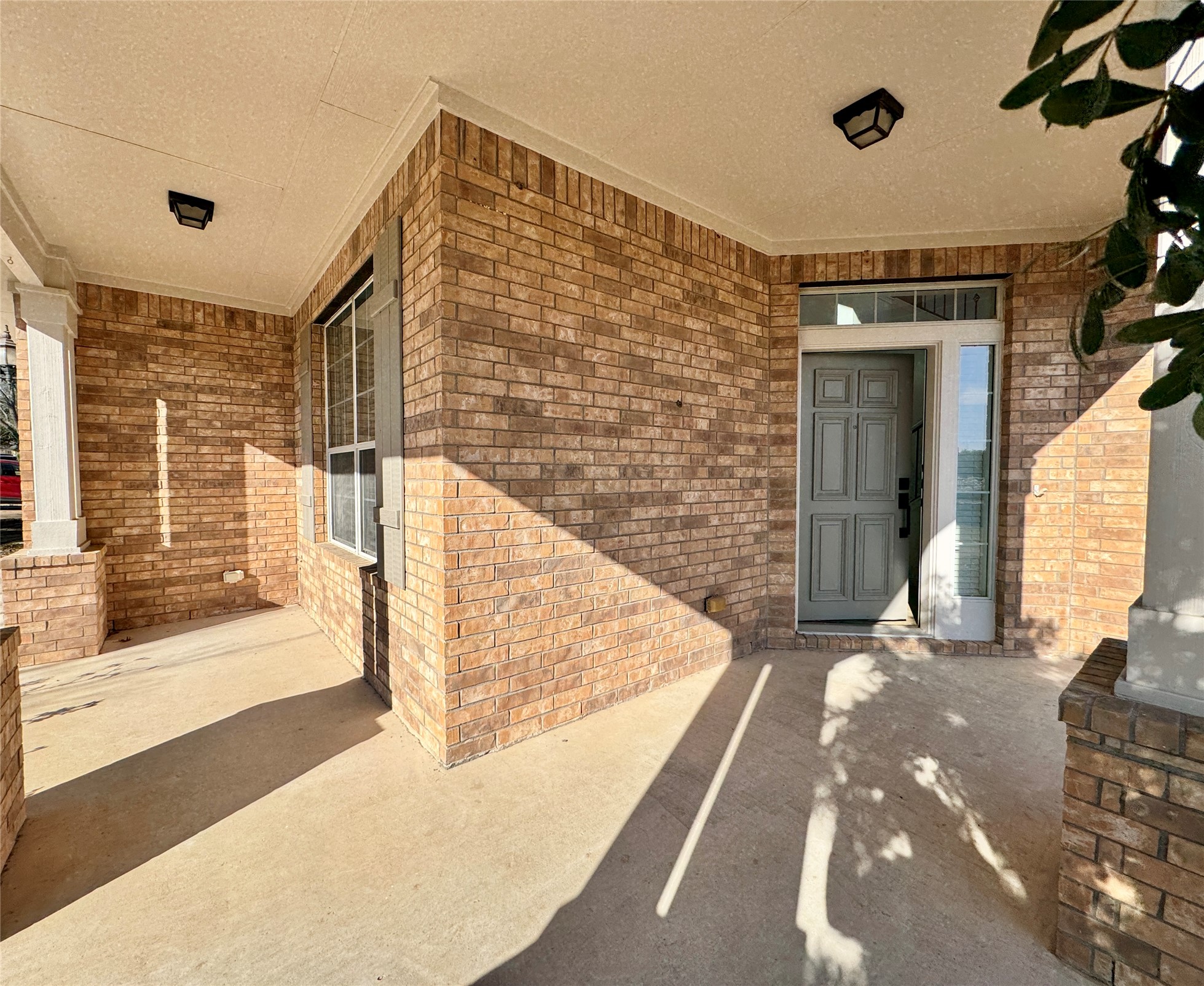 3640 Fossilwood Way Round Rock, TX 78681 - Photo 2 of 19 Doorway to property with brick siding