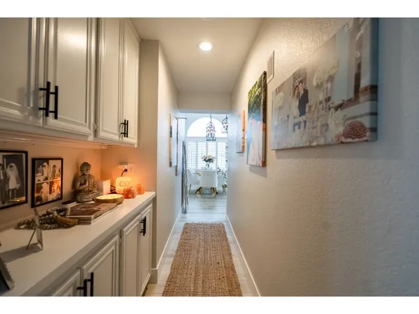 a bathroom with a sink a mirror and a shower