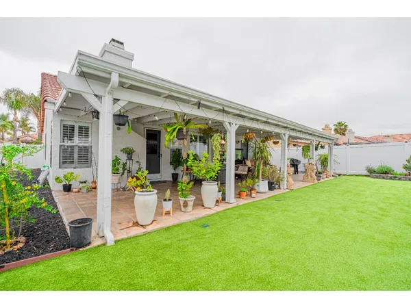 a front view of building with yard