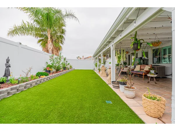 a view of an house with a swimming pool