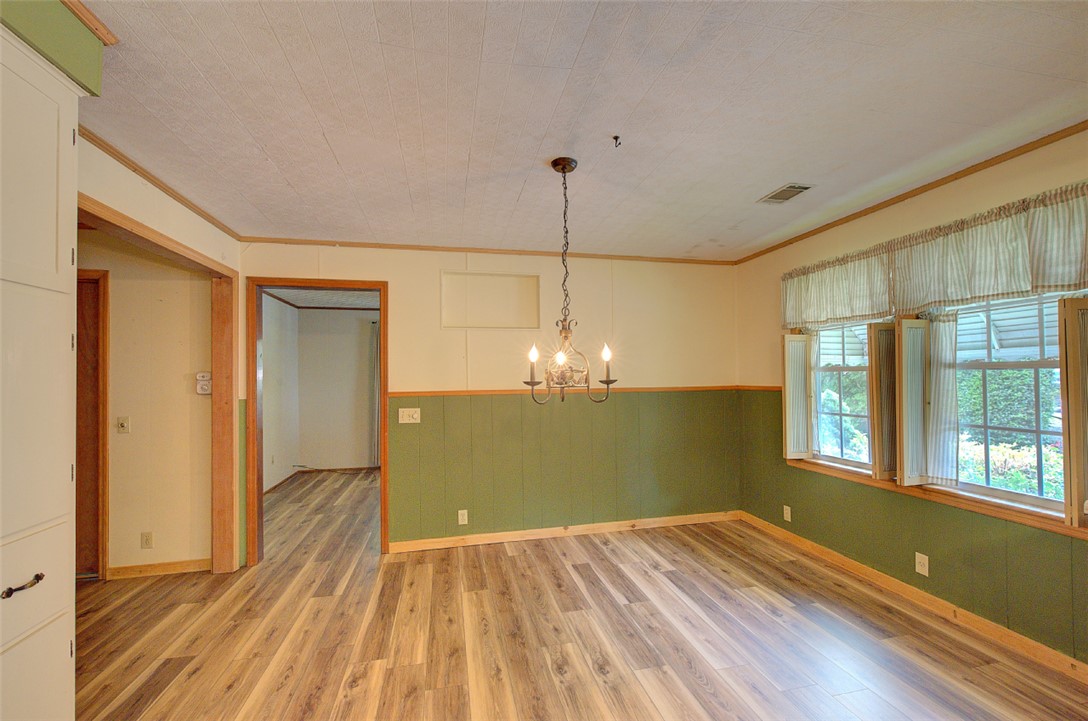 5064 Keowee School Road Seneca, SC 29672 - Photo 19 of 49 This bright room features durable flooring and abundant natural light.