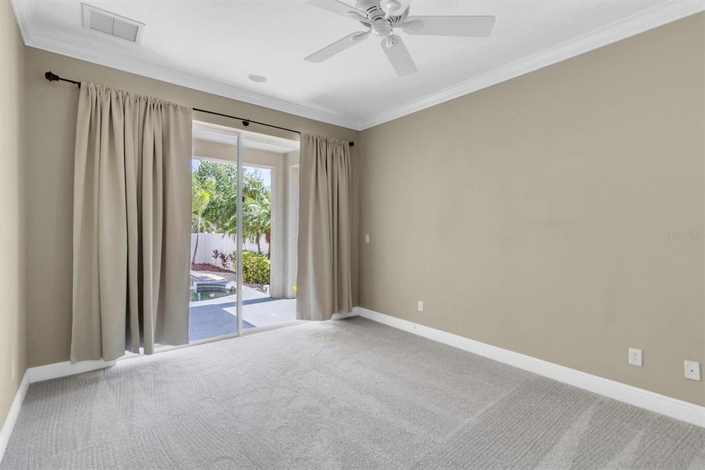 10121 Porch Street New Port Richey, FL 34655 - Photo 20 of 57 an empty room with windows and closet
