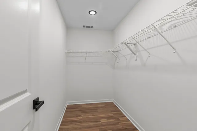 a view of a room with racks on the wall