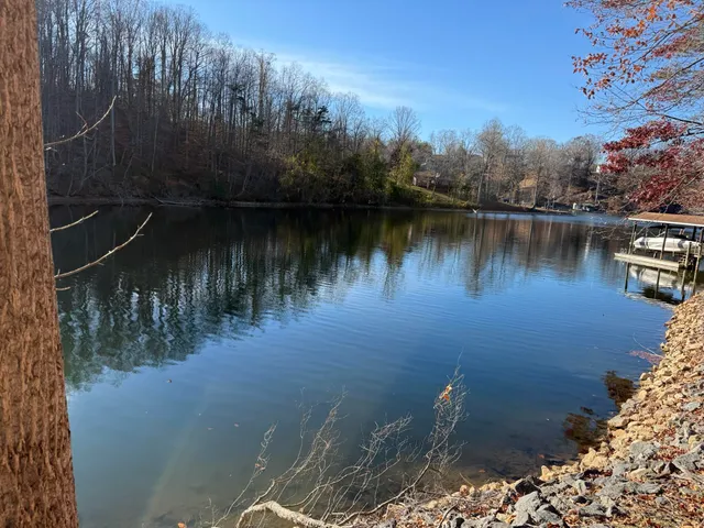 a wooden pier with lake view