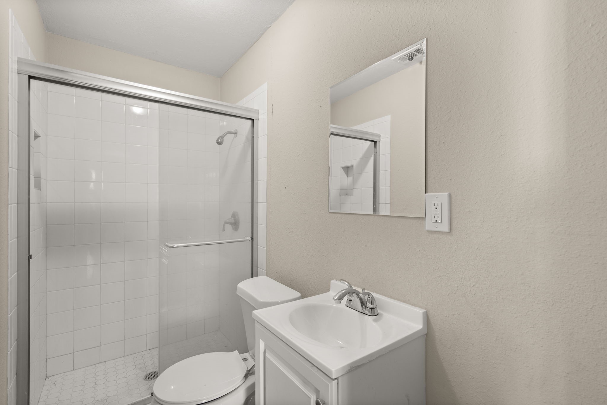 3031 Friar Point Road Houston, TX 77051 - Photo 8 of 15 a bathroom with a sink mirror and toilet