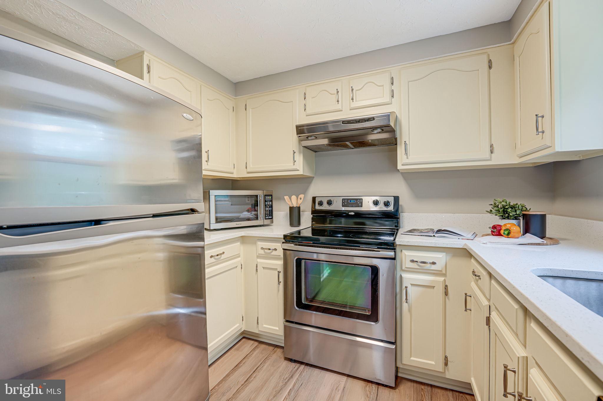 11014 Granby Court Reston, VA 20191 - Photo 12 of 46 Stainless Steel appliances and lots of cabinets!
