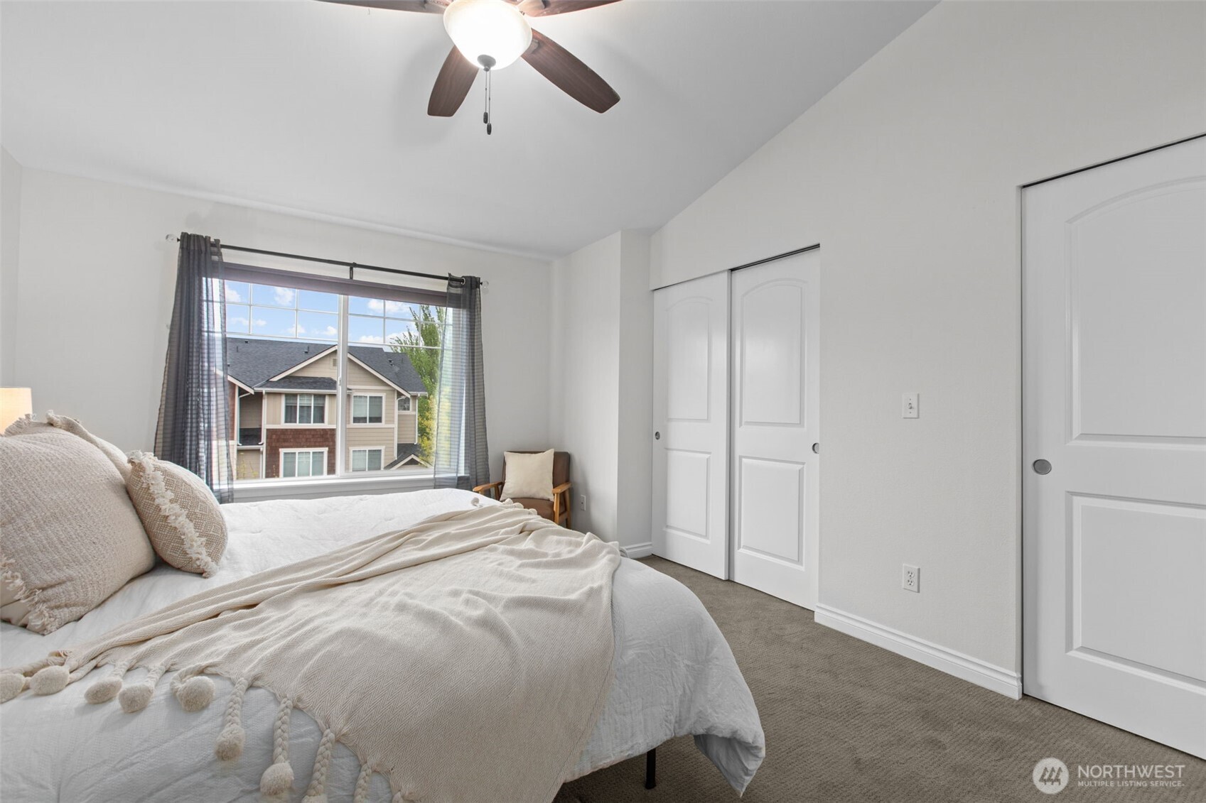 532 Pilchuck Path Everett, WA 98201 - Photo 16 of 37 a bedroom with a bed and a window