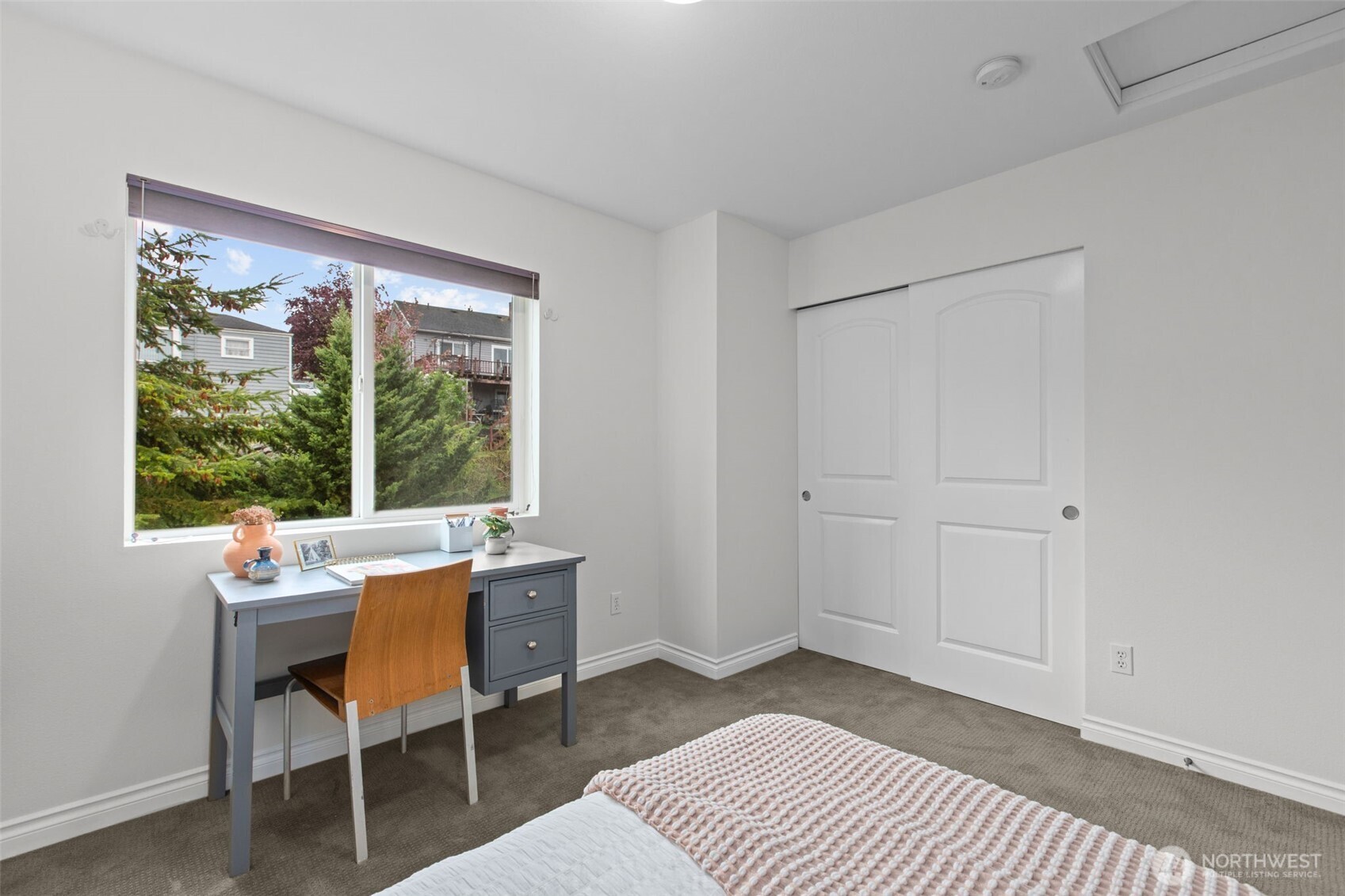 532 Pilchuck Path Everett, WA 98201 - Photo 22 of 37 a bedroom with a bed and a table