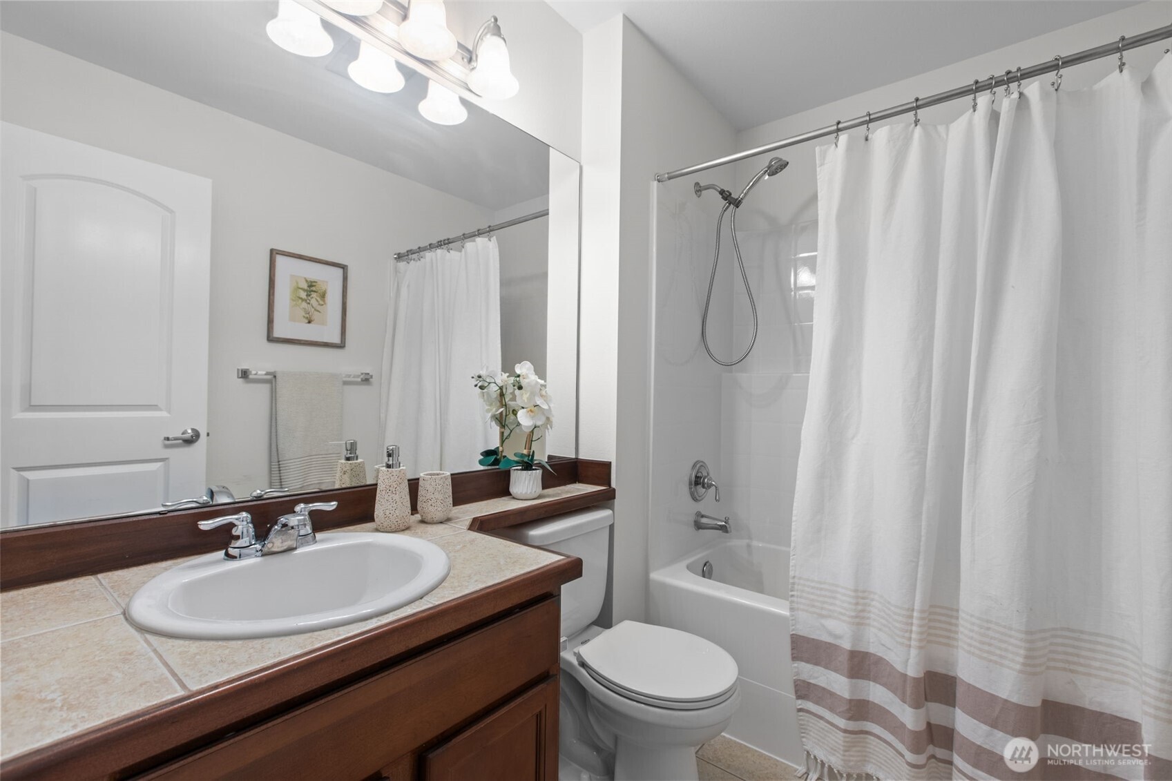 532 Pilchuck Path Everett, WA 98201 - Photo 24 of 37 a bathroom with a granite countertop sink toilet a shower and a mirror