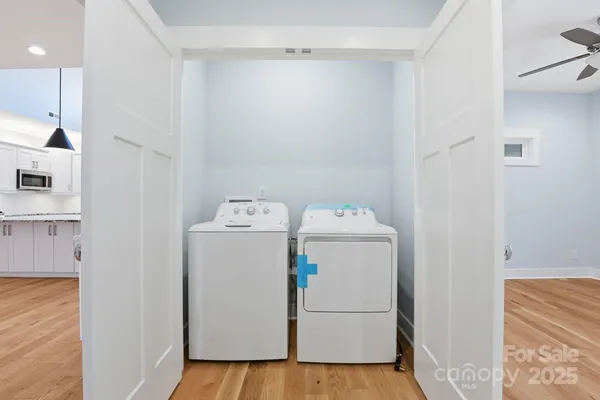 a utility room with dryer and washer