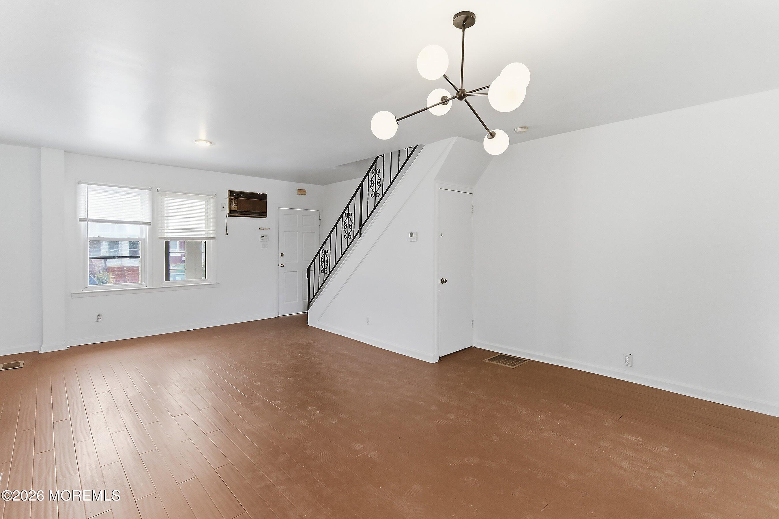 46 West 12th Street Linden, NJ 07036 - Photo 7 of 18 a view of empty room with wooden floor