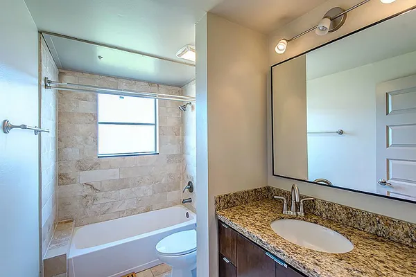 a view of a hallway with washer and dryer
