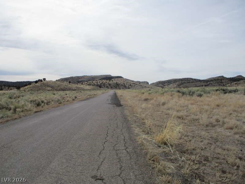 Eagle Valley Road Pioche, NV 89043 - Photo 6 of 15 View of asphalt road with a mountain view and a view of rural / pastoral area