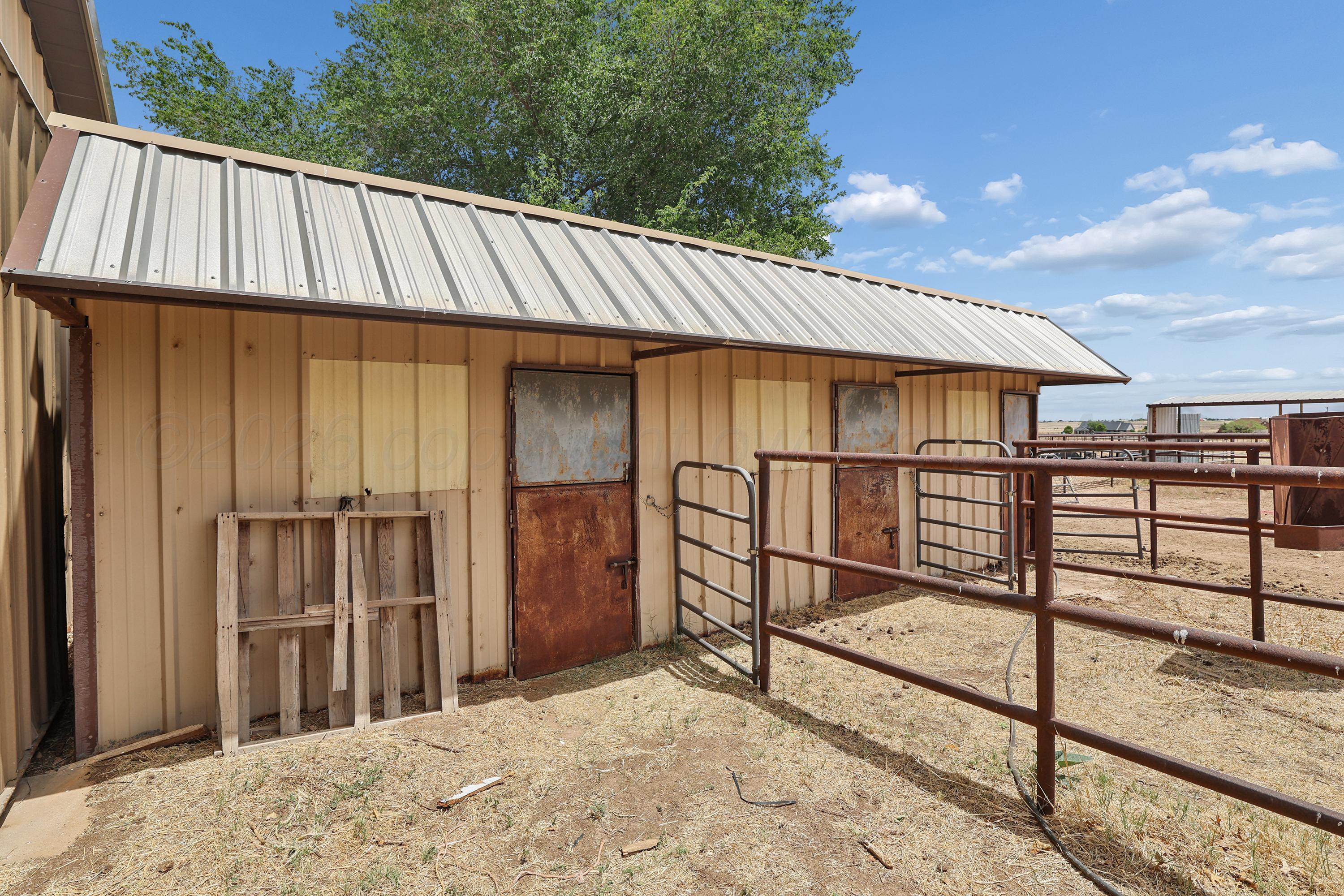 14653 Halsey Trail Amarillo, TX 79118 - Photo 42 of 67 47-Horse Stalls with Pen