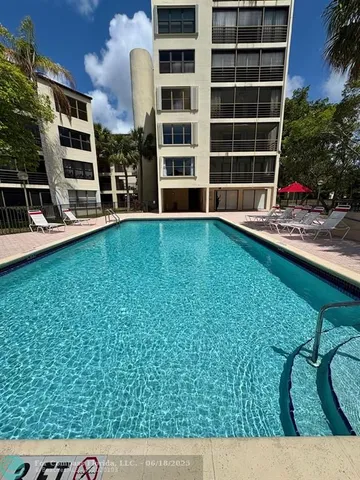 a view of a house with a garden