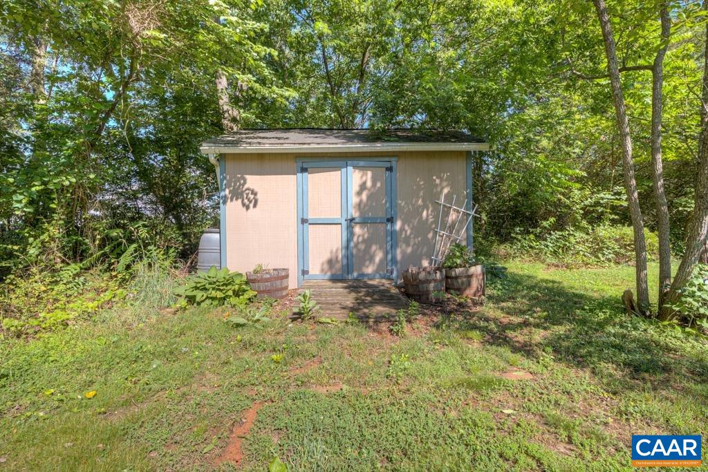 61 Pinewood Court Ruckersville, VA 22968 - Photo 21 of 24 a view of house with backyard