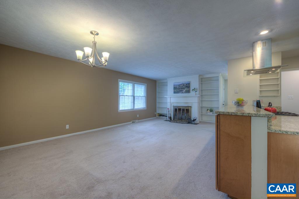 61 Pinewood Court Ruckersville, VA 22968 - Photo 6 of 24 a view of a livingroom with furniture and a fireplace