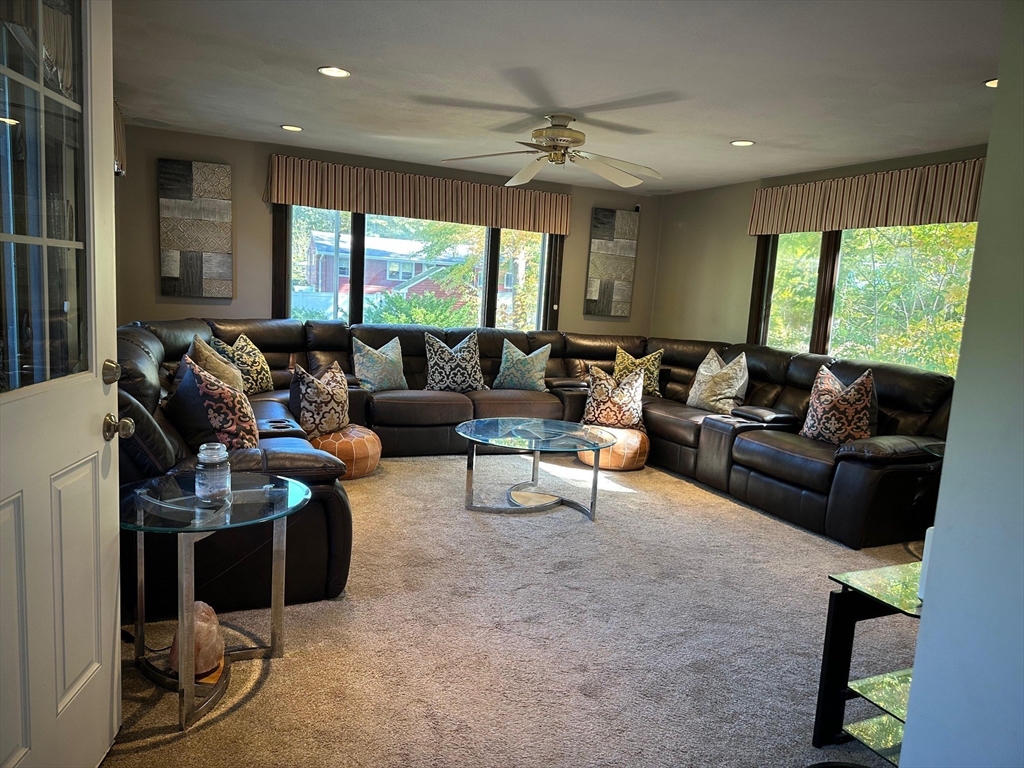 223 Robert Road Dedham, MA 02026 - Photo 7 of 18 a living room with furniture and a large window