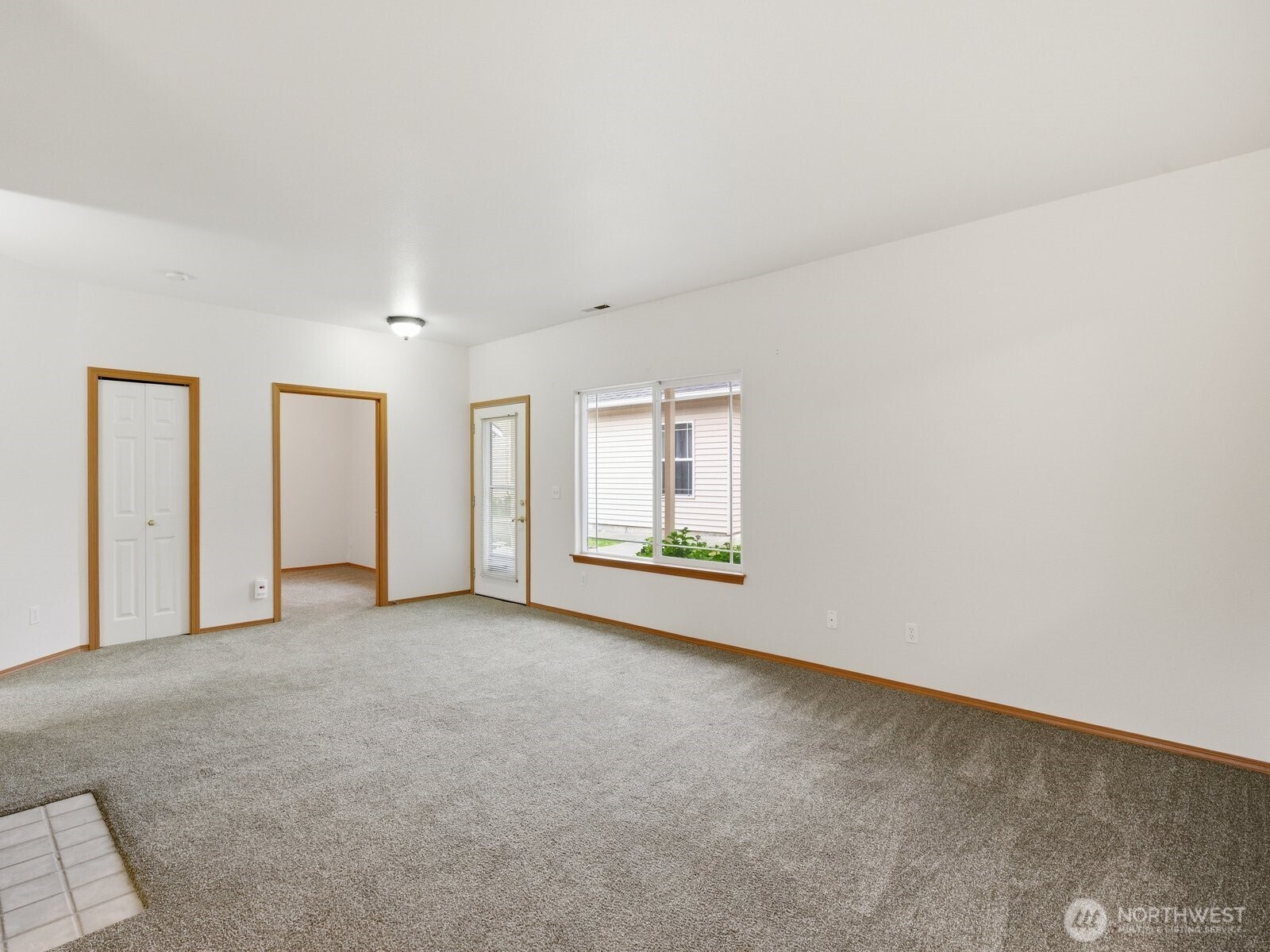323 North Laventure Road, Unit C Mount Vernon, WA 98273 - Photo 12 of 24 an empty room with windows