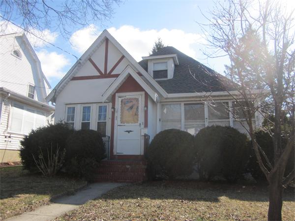 33 Beal Road Waltham, MA 02453 - Photo 1 of 9 a front view of a house with garden