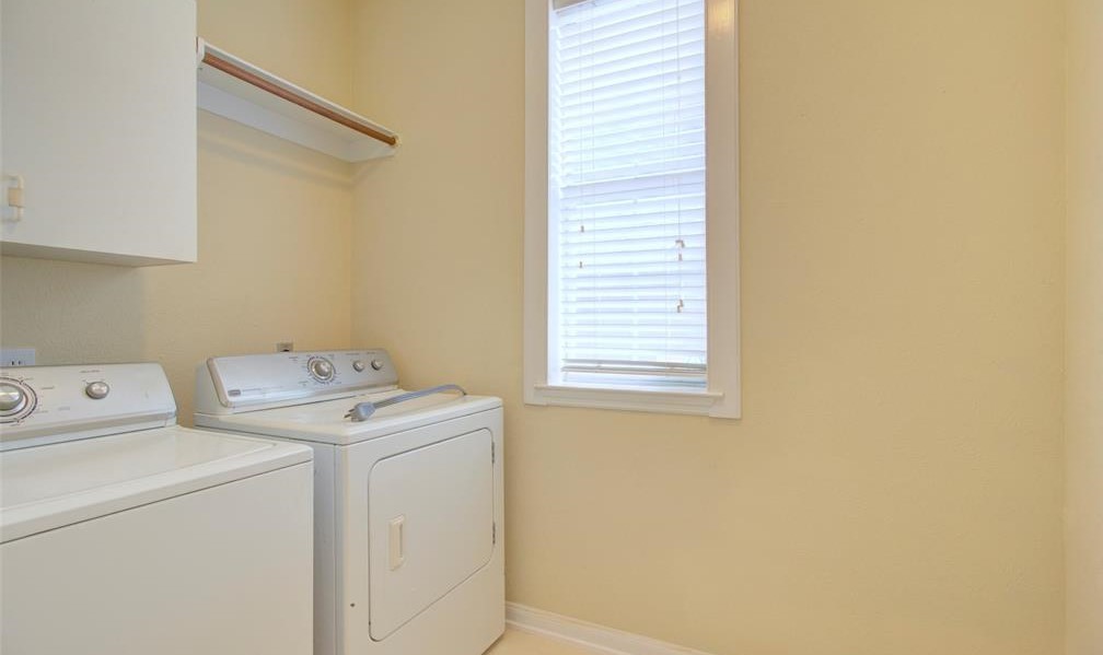 1226 Rabbs Crossing Sugar Land, TX 77479 - Photo 11 of 50 a utility room with dryer and washer