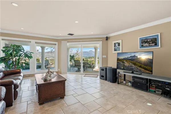 a large kitchen with stainless steel appliances granite countertop a stove a sink dishwasher and cabinets with wooden floor