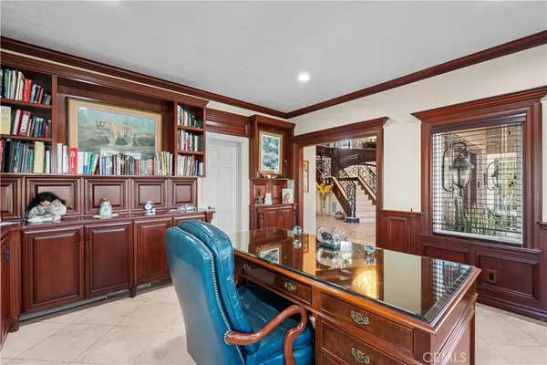 a kitchen with stainless steel appliances granite countertop a kitchen island a stove and a sink