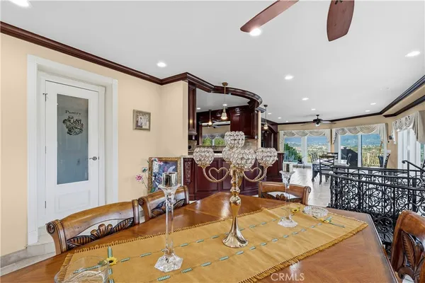 a bathroom with a granite countertop shower a mirror and a sink