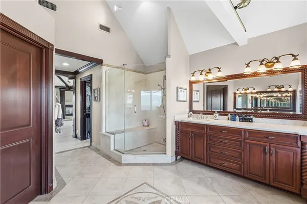 a view of a terrace with a table and chairs