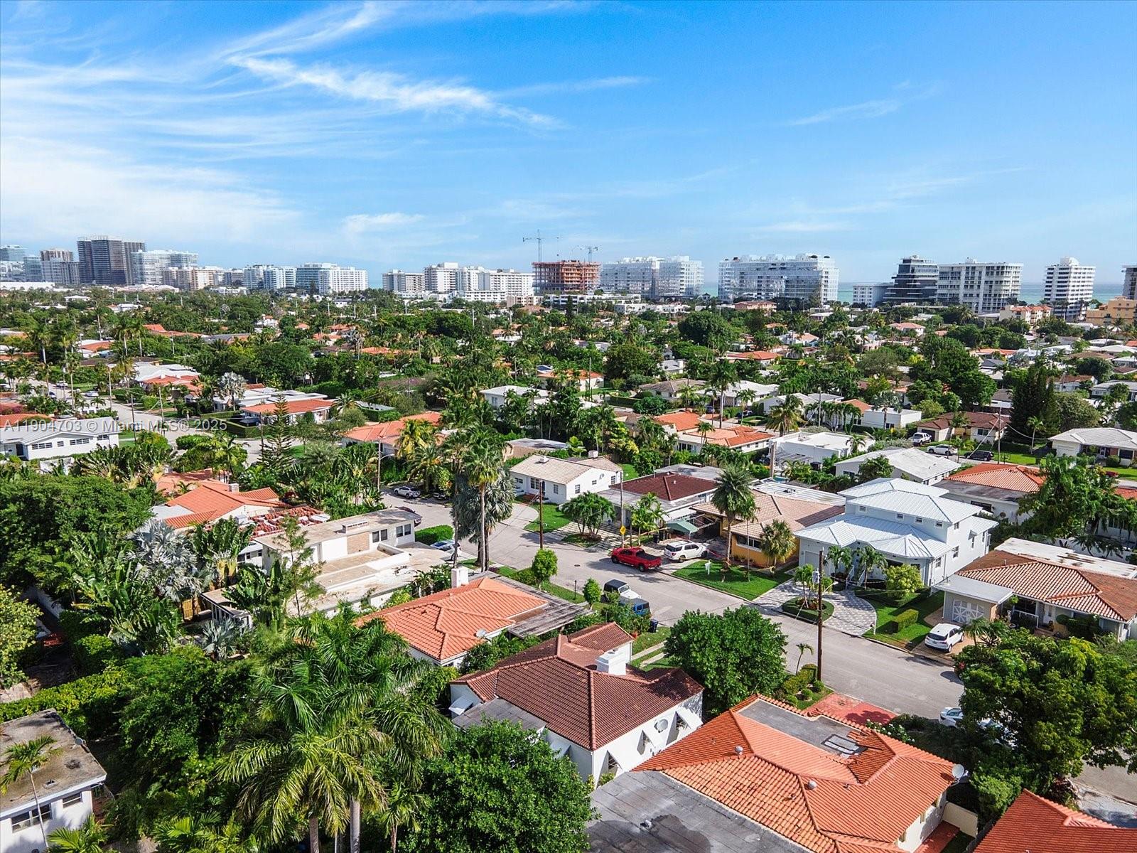 8826 Emerson Avenue Surfside, FL 33154 - Photo 23 of 25 an aerial view of a city with lots of residential buildings