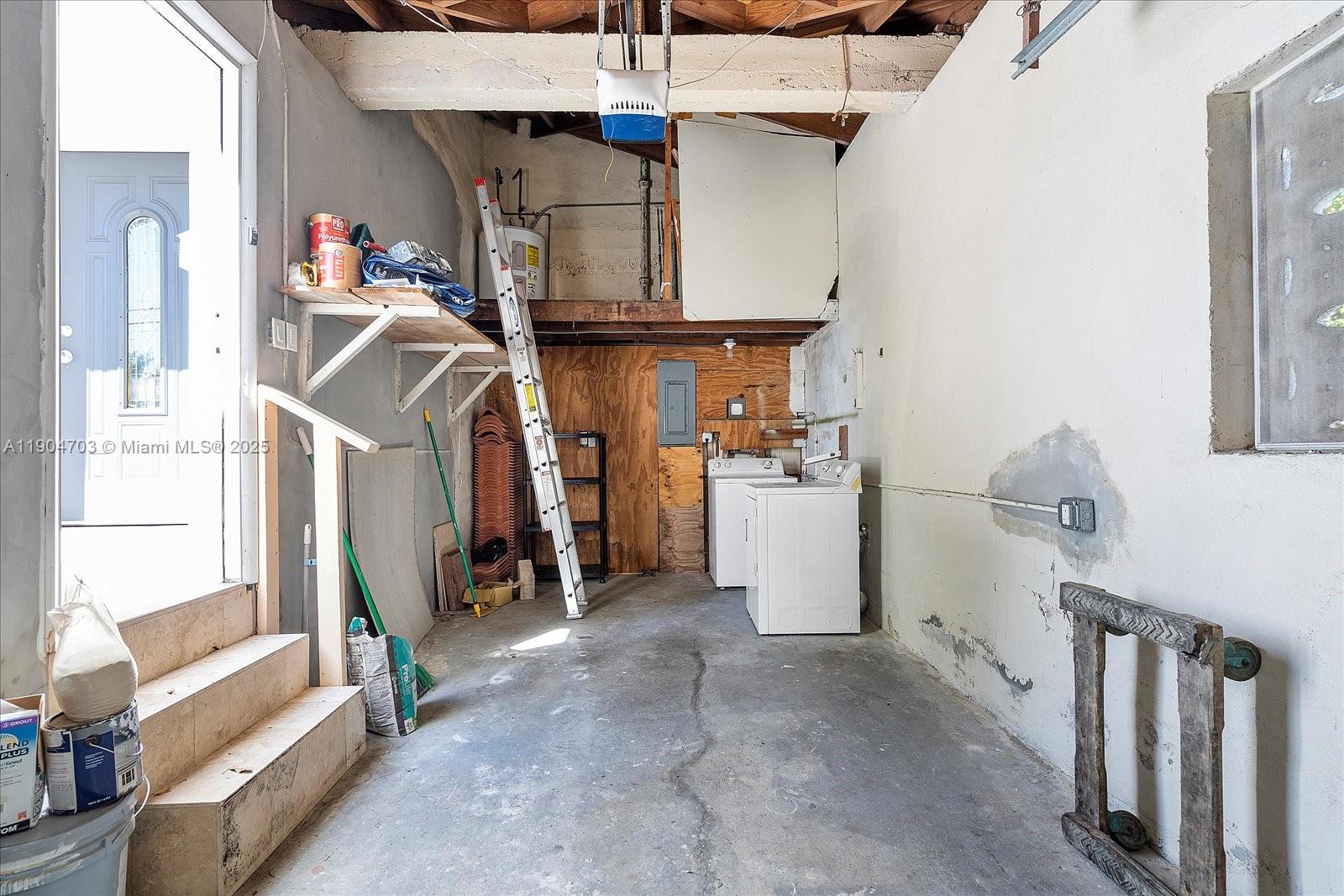 8826 Emerson Avenue Surfside, FL 33154 - Photo 25 of 25 a utility room with cabinets