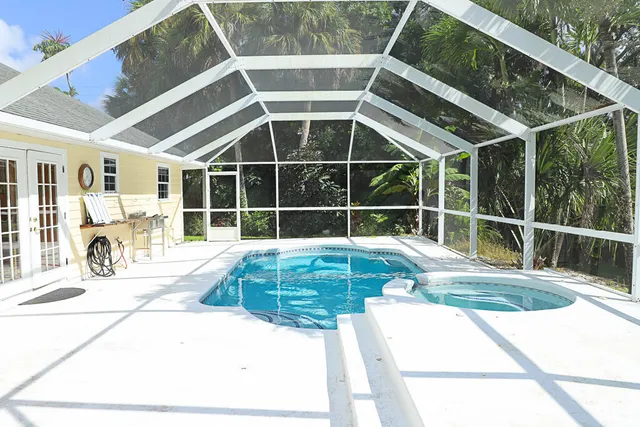 a view of a house with a swimming pool