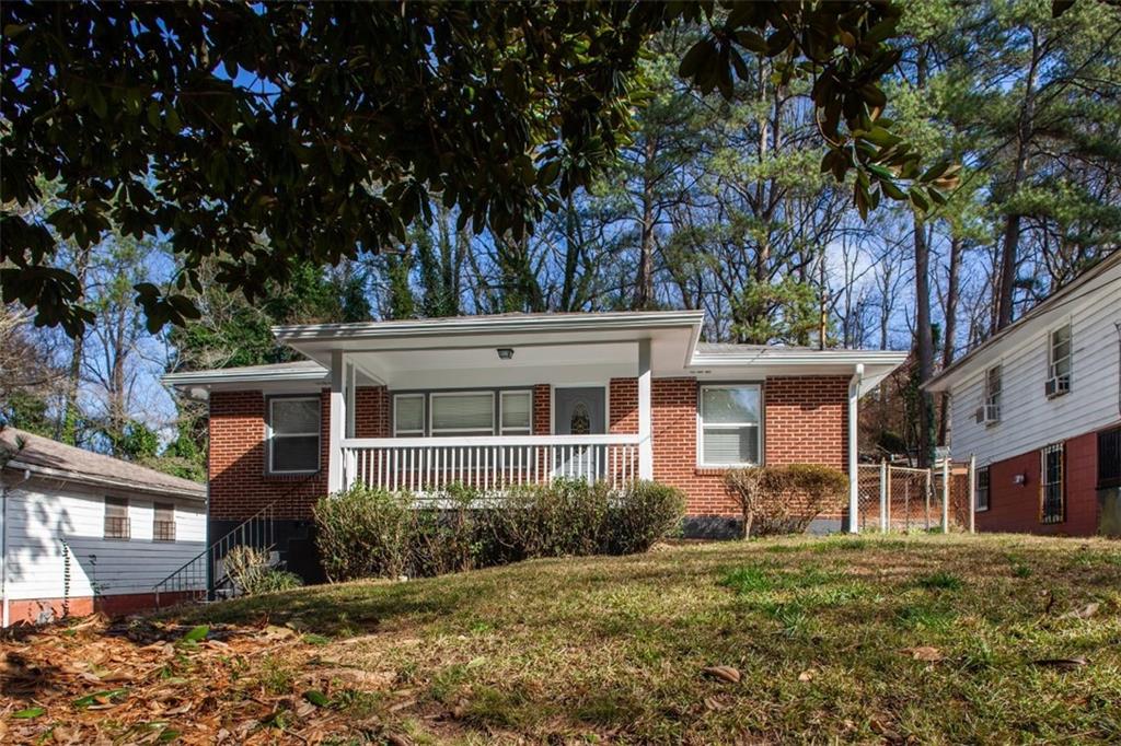 155 Holly Road Northwest Atlanta, GA 30314 - Photo 1 of 1 Charming brick renovation in Hunter Hills