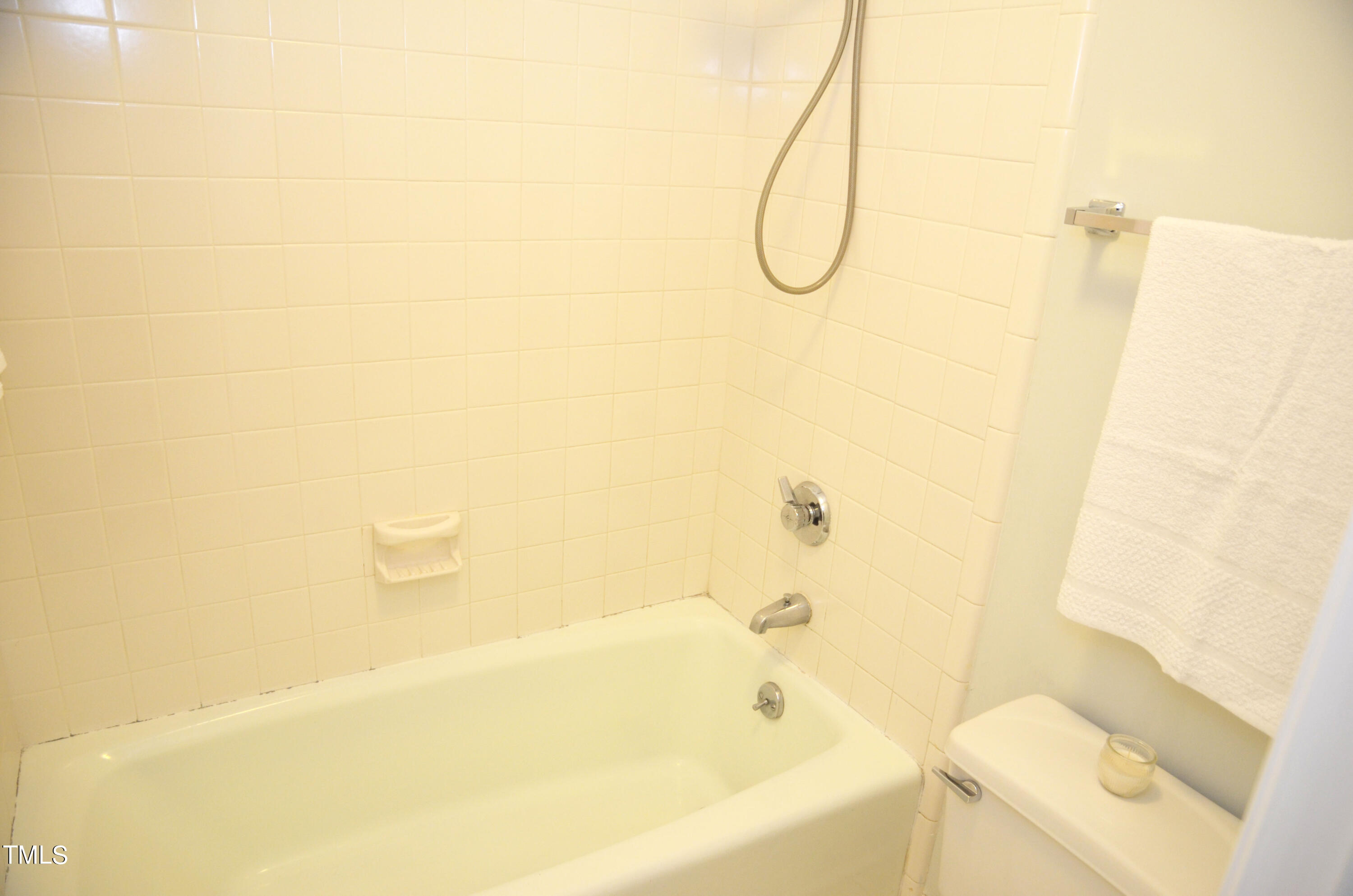 5708 Old Forge Circle Raleigh, NC 27609 - Photo 22 of 31 a bathroom with a bath tub
