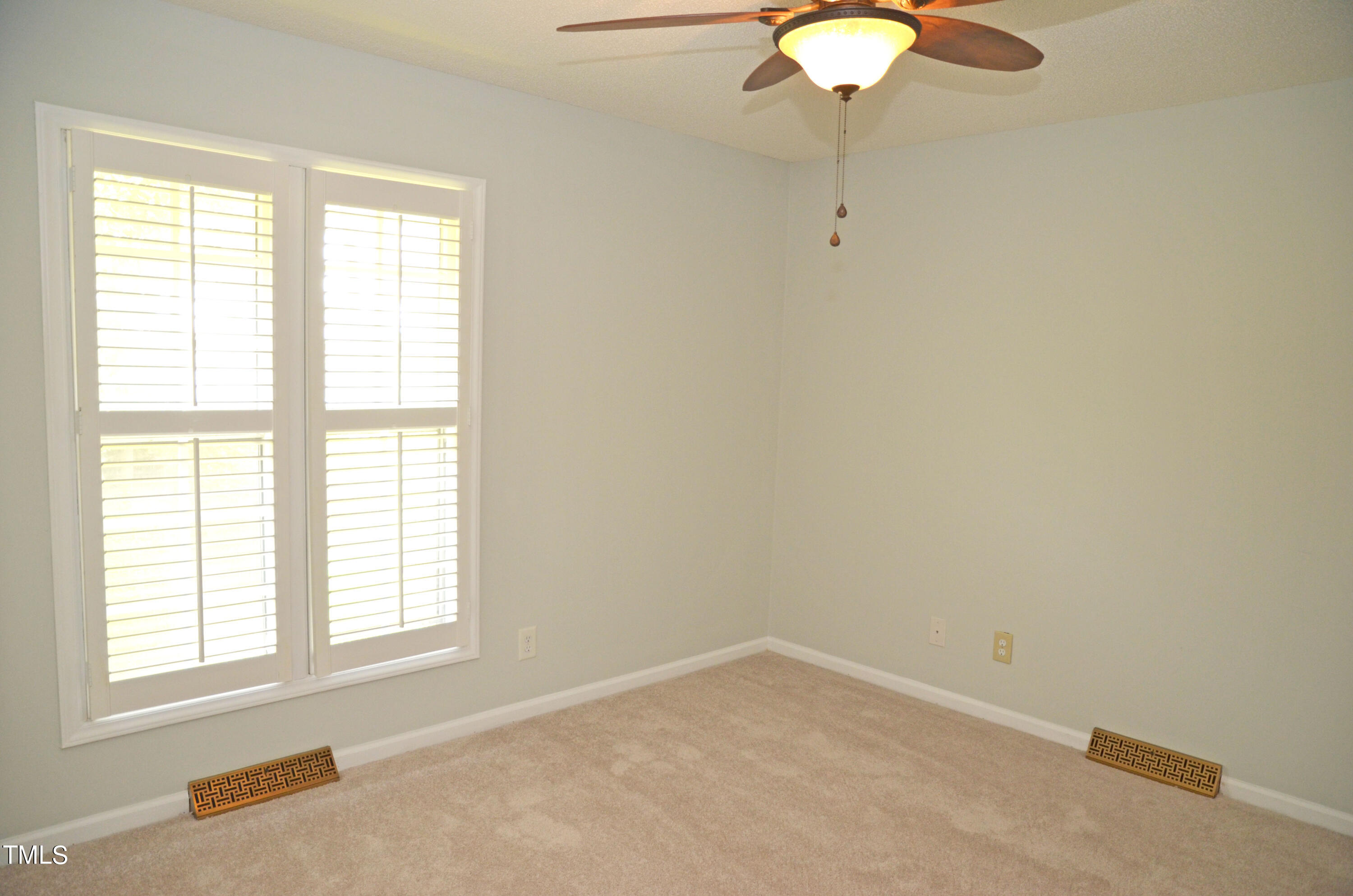 5708 Old Forge Circle Raleigh, NC 27609 - Photo 23 of 31 an empty room with a window