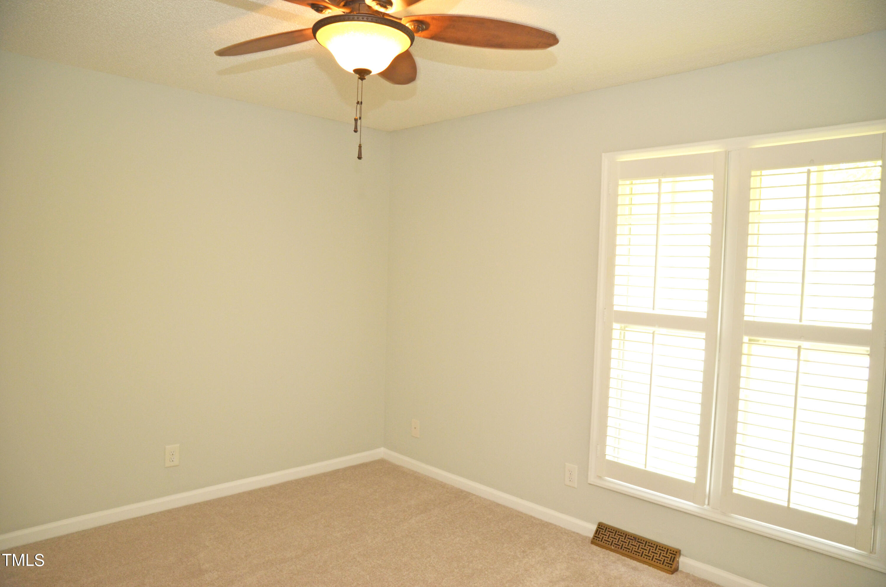 5708 Old Forge Circle Raleigh, NC 27609 - Photo 24 of 31 a small space with a window and a fan