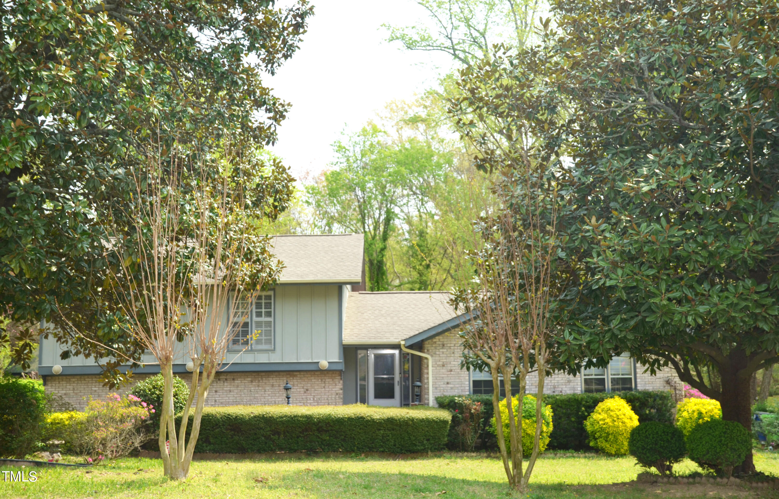 5708 Old Forge Circle Raleigh, NC 27609 - Photo 26 of 31 a front view of a house with a yard