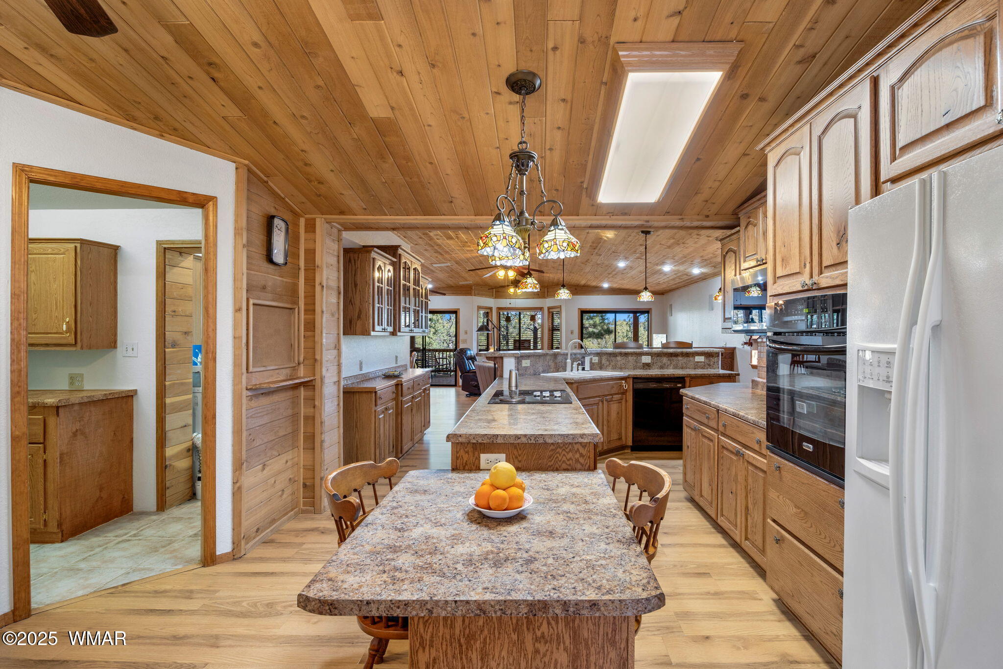 1904 Rim View Lane Heber, AZ 85928 - Photo 18 of 68 a kitchen with stainless steel appliances granite countertop breakfast area